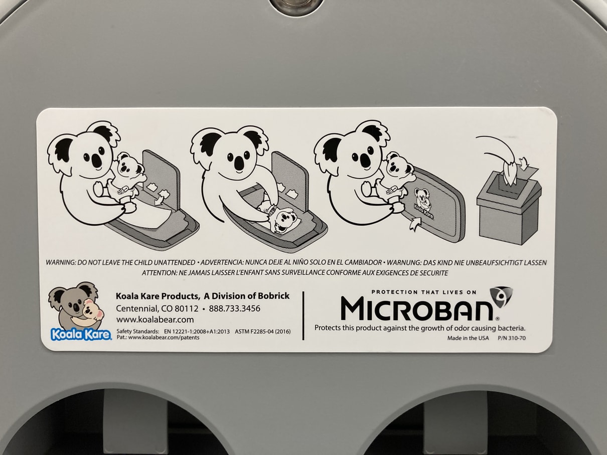 Visual instructions on how to use Koala Kare brand baby changing station. Pictures depict a baby koala being changed by a mother koala.